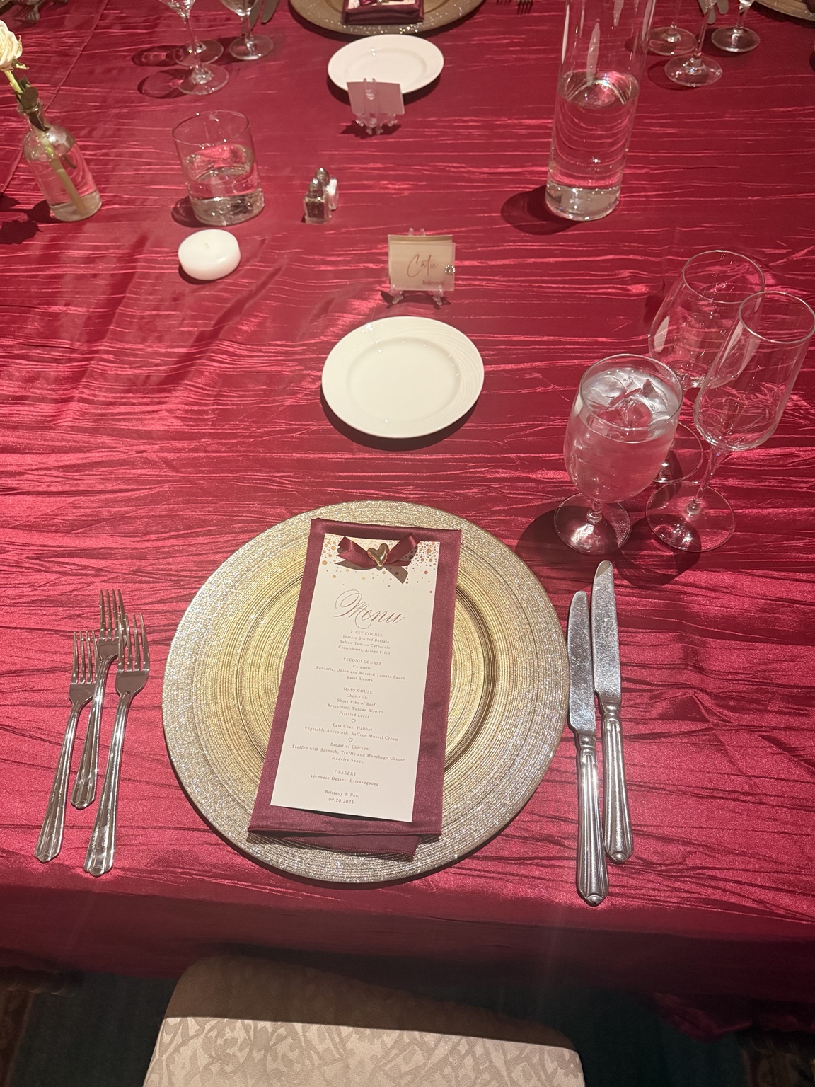 Formal red and gold place setting